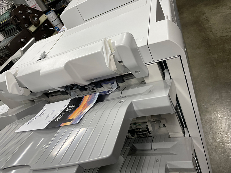 commercial printer at Eagle Eye Printing offering, printing, binding, finishing, and create services